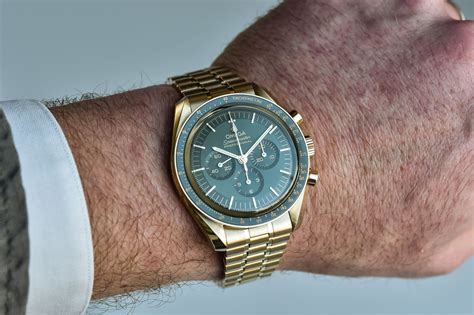 gold watch green dial.